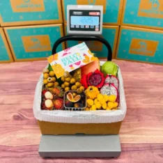 Assorted tropical fruits in a 12 Pound Tropical Hell Fruit Feast Box